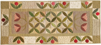 Spring Blooms patchwork and applique quilted table runner pattern by Norma Whaley